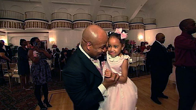 PHOTO: Seen here is a Father bonding with his daughter at a dance in In Harlems Alhambra Ballroom.