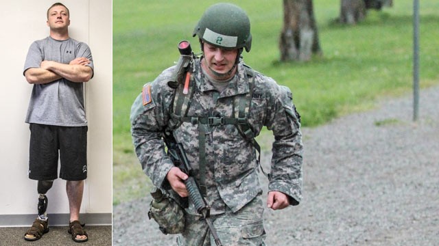 PHOTO: Army Sgt. 1st Class Greg Robinson, an amputee with the 101st Airborne Division graduated from air assault school on April 29, 2013.