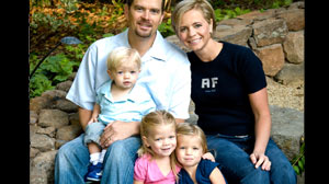 PHOTO Dr. Erin Jacobson, 37, and his wife, Amy, 35, are shown in this file photo with their children, left, Jude, 2, Taylor, 4, center, and Ava, 3. All five were killed in the plane that crashed in Montana Sunday.