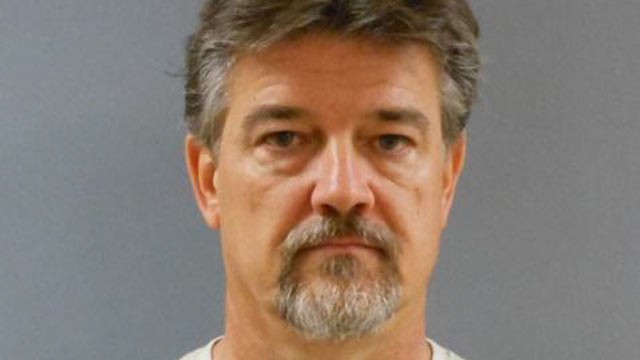 PHOTO: Booking photo of John Franklin Howard, arrested in connection with the August 18, 2012 shooting of his wife, Nancy Howard, at their residence in Carrollton, TX, Aug. 26, 2012.