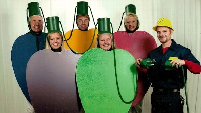 In Eagan, Minn., Sue Johnson's clan -- husband Rob and children Valerie, Erica and Michael -- poses for its Christmas photo in 2007. Erica's husband, Andy Riehm, was persuaded to join in the fun that year.