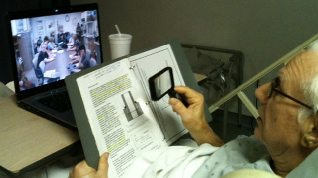 PHOTO: Professor William Kielhorn achieved 45 years of perfect attendance by not missing a single class by giving his last lecture via teleconference from his hospital bed.