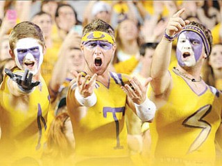 LSU Sorry for Erasing Crosses in Photo