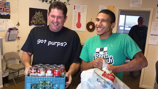 PHOTO: Employees of Granny Purps medical marijuana dispensary in Soquel, Calif. collect cans of food traded for free joint.