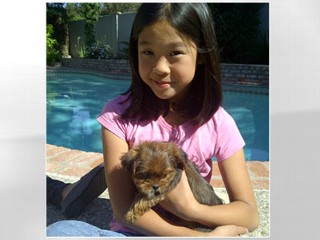 Girl Reunited With Stolen Dog After Offering Piggy Bank Reward