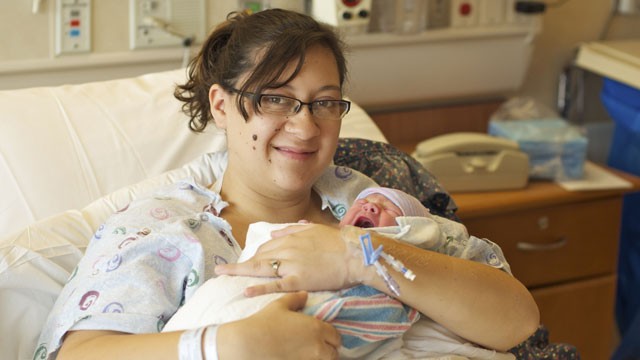 PHOTO: Katie Medley holds her newborn son, Hugo Jackson Medley, who was born July 24, 2012, in University of Colorado Hospital, where father Caleb Medley was being treated for injuries suffered in the Aurora, Colo., theater shooting.