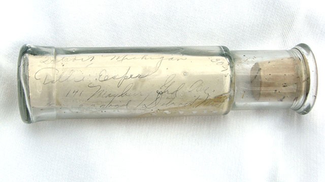 PHOTO: Dave Leander, owner of the Great Lakes Divecenter in Shelby Township, Mich., found this message in a bottle in June 2012 and it will be reunited with descendants of one of the women who wrote the note in July 2013.