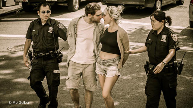 PHOTO: Mo Gelber photographed this couple entering Manhattan Criminal Court on August 16, 2012 and has been searching for their identities using social media.