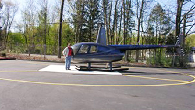PHOTO: Paul Blanchette and his helicopter