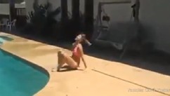 PHOTO: An Arizona mom has been chastised after posting a video of her teenage daughter jumping from the house roof onto cement, missing the swimming pool a few inches away.