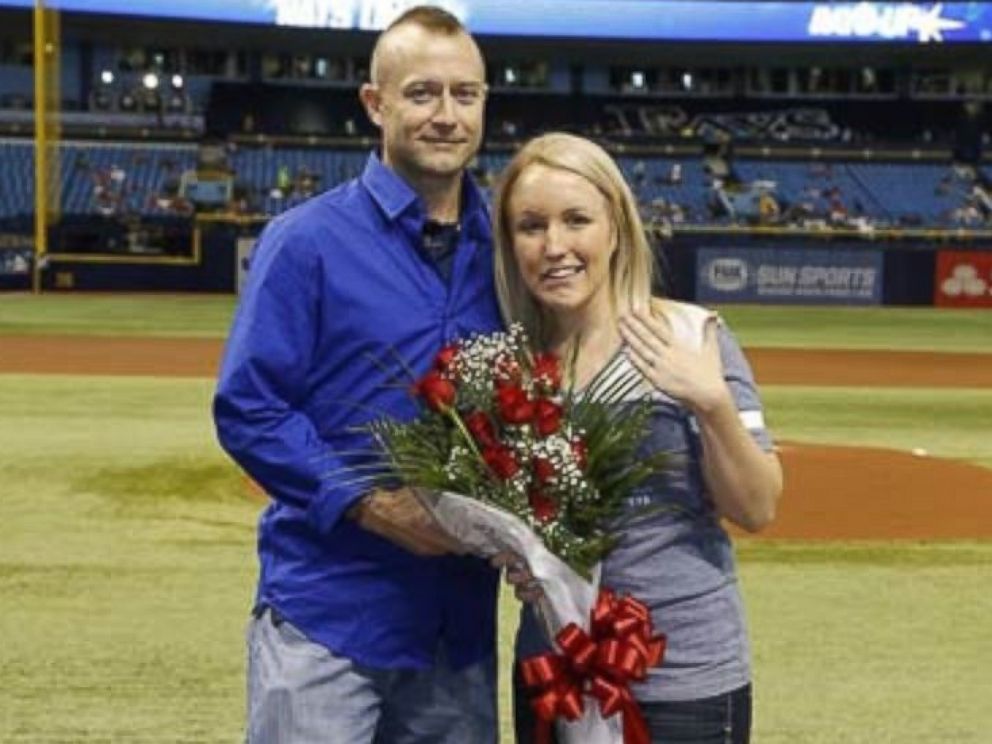 PHOTO: Cameron Hill, a first responder, proposed to Melissa Dohme at a baseball game on Monday.