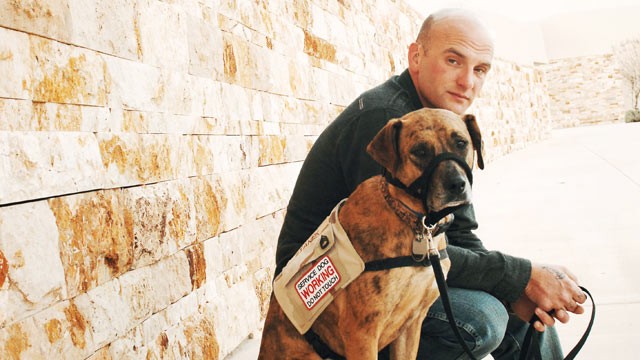 PHOTO: James Stanek is helped with his PTSD and physical disabilities by his dog Sarge.