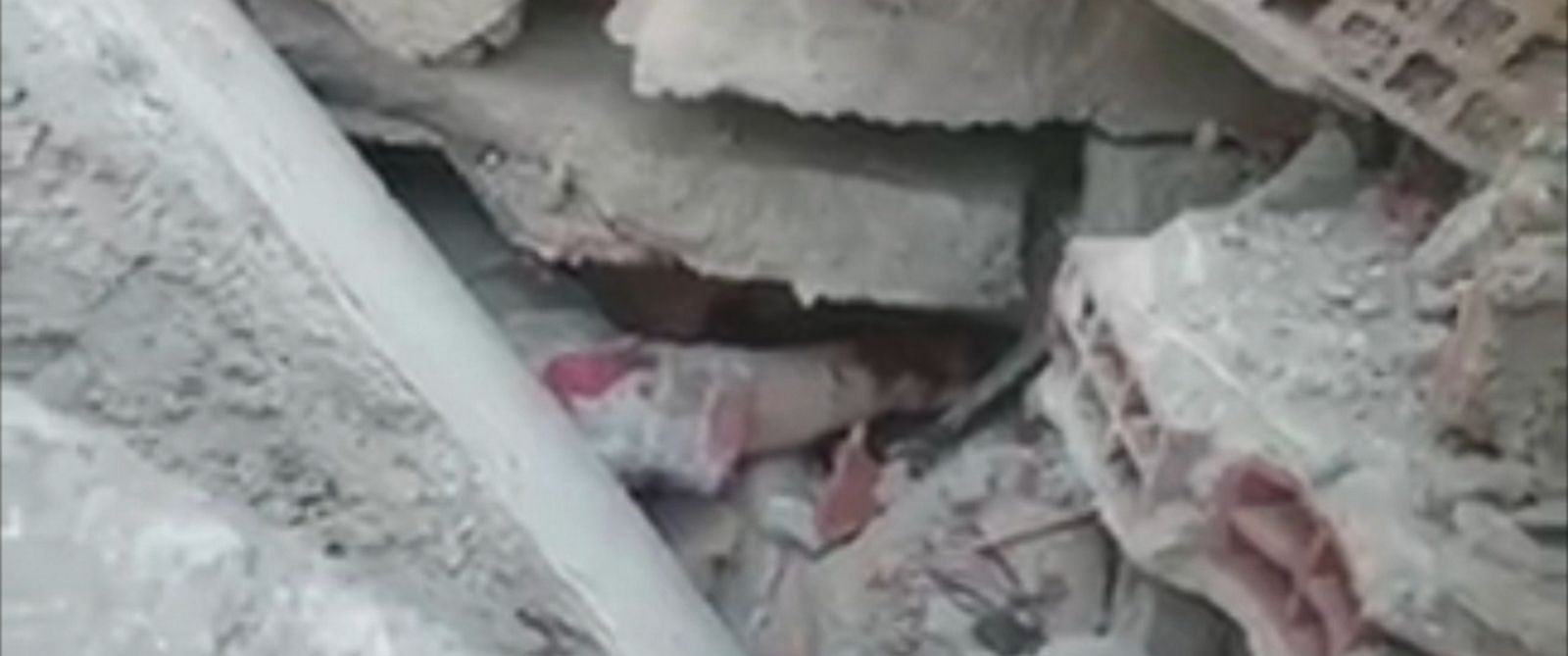 Rescuer Calms Woman Trapped Under Rubble After Italy Earthquake - ABC News