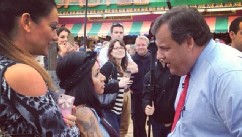 PHOTO: Snooki speaks with New Jersey Governor Chris Christie on May 24, 2013.