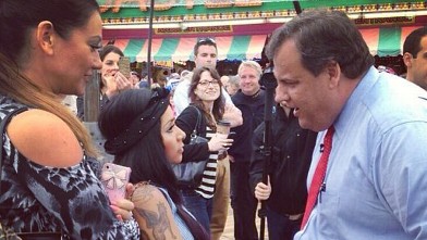 PHOTO: Snooki speaks with New Jersey Governor Chris Christie on May 24, 2013.