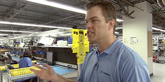 PHOTO: Rick Smith, who founded Taser International with his brother Tom Smith, takes "Nightline" through a tour of the companys Scottsdale, Ariz., manufacturing facility.