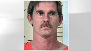 PHOTO Travis Marburger, 36, shown in this bookin photo, was arrested and charged with Manslaughter, Dec. 7, 2010. Marburger?s 10 acres will be the focus of an excavation.