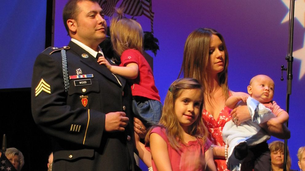 PHOTO: Brian Wood, left, pictured with his family.