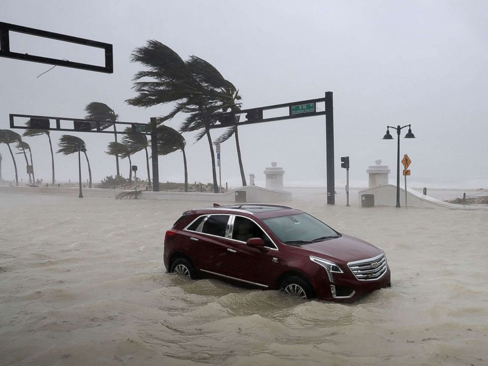 PHOTO: A car sits abandoned in storm surge waters along North Fort Lauderdale Beach Boulevard as Hurricane Irma hits the southern part of the state Sept. 10, 2017 in Fort Lauderdale, Fla.