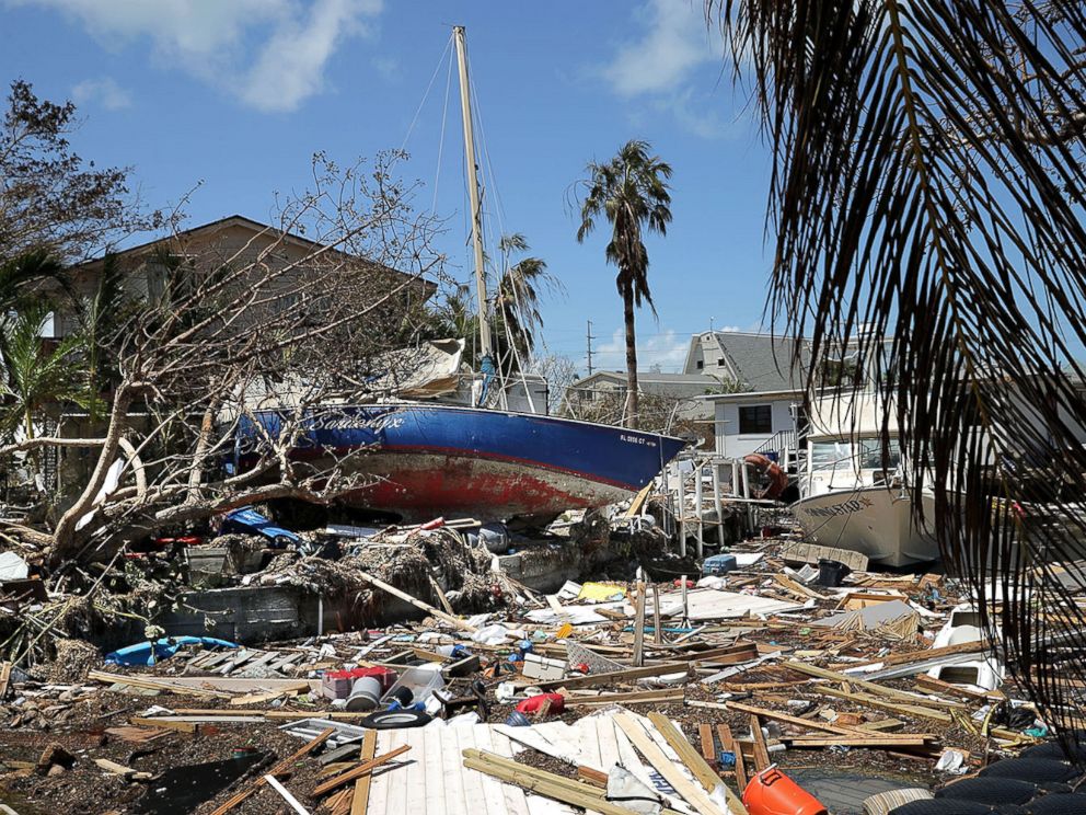 Photos capture obliterated homes, resilient survivors in ...