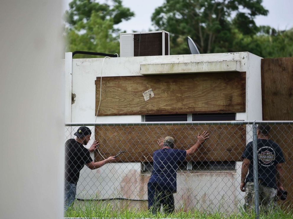 PHOTO: Residents of Las Lomas community board up windows in preparation for Hurricane Irma, in Ceiba, Puerto Rico, Sept. 6, 2017.