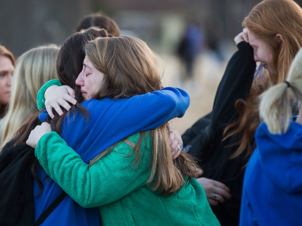 PHOTO: Students embrace following a prayer vigil at Paducah Tilghman High School in Paducah, Ky., Jan. 24, 2018, in Paducah, Ky. 