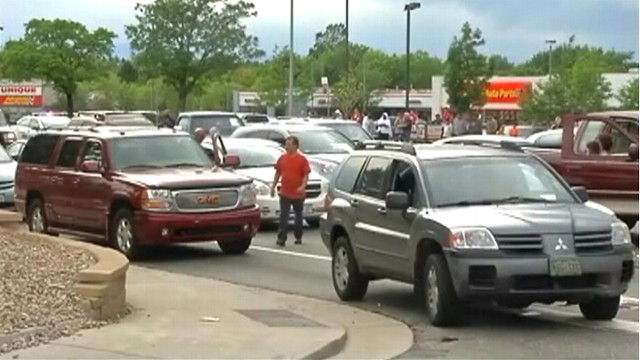 VIDEO: Aurora, Colo., police stop and handcuff all adults in search for bank robber.