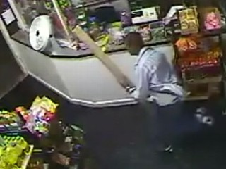 Watch: Armed Robber Chased Off With Stick