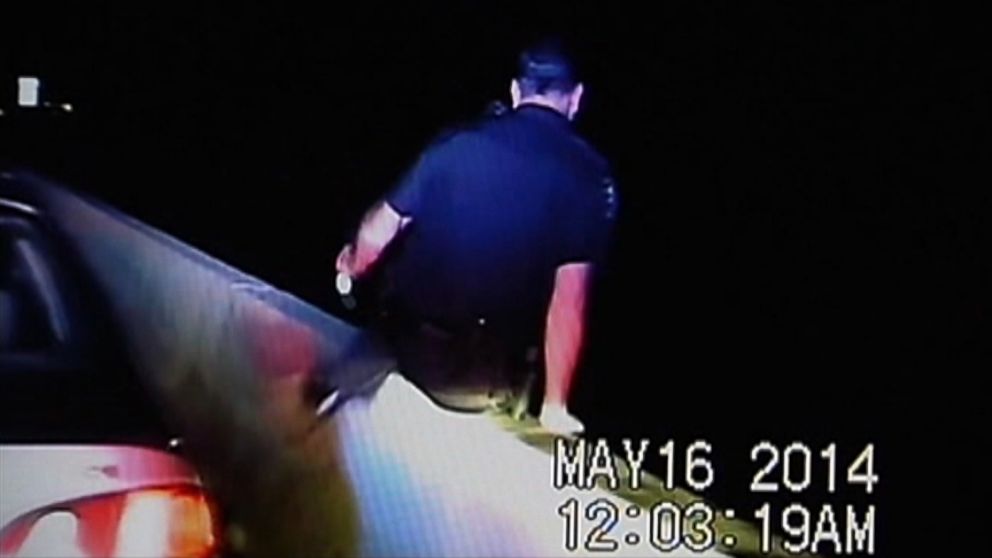 The officer was hospitalized after he leaped from an overpass to avoid a suspected drunk driver.