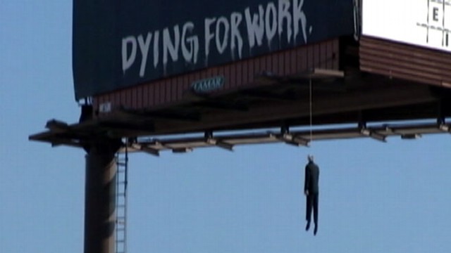 VIDEO: A dark-suited mannequin hanging by a noose led to a series of 911 calls.