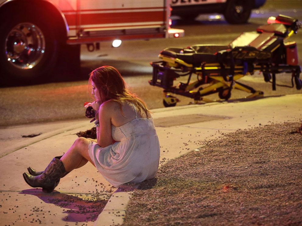 PHOTO: Two festivalgoers leave the area around the Mandalay Hotel after a gunman killed more than 50 people and wounded more than 500 others when he opened fire on a country music concert in Las Vegas, Oct. 2, 2017. <p itemprop=