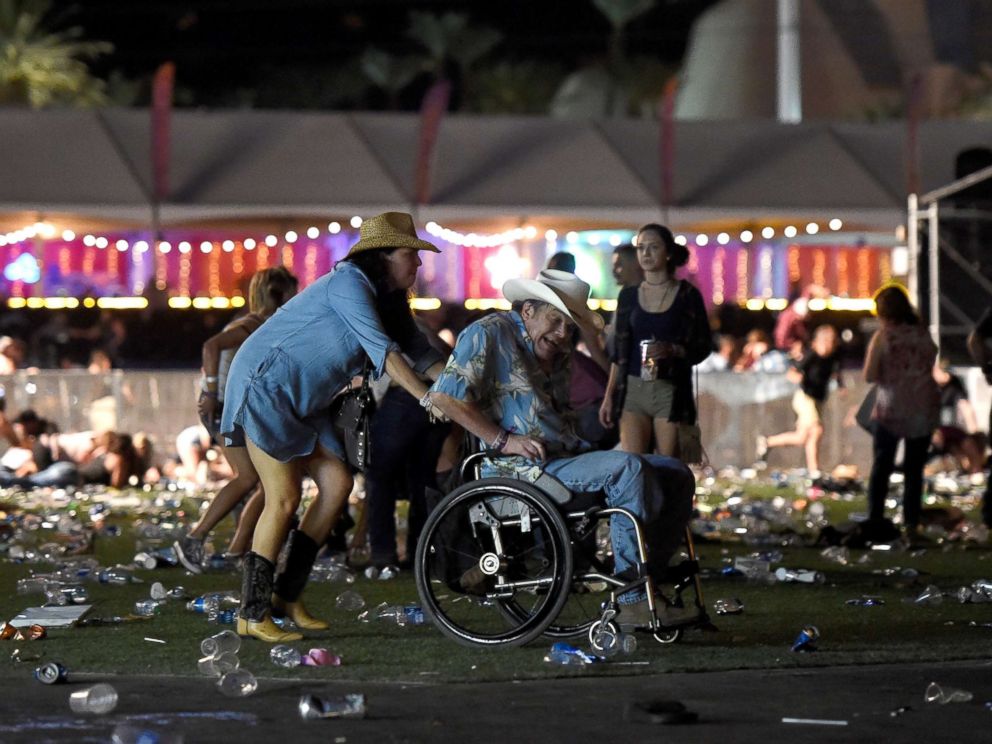 PHOTO: A man in a wheelchair is taken away from the Route 91 Harvest country music festival after gun fire was heard, Oct. 1, 2017 in Las Vegas.