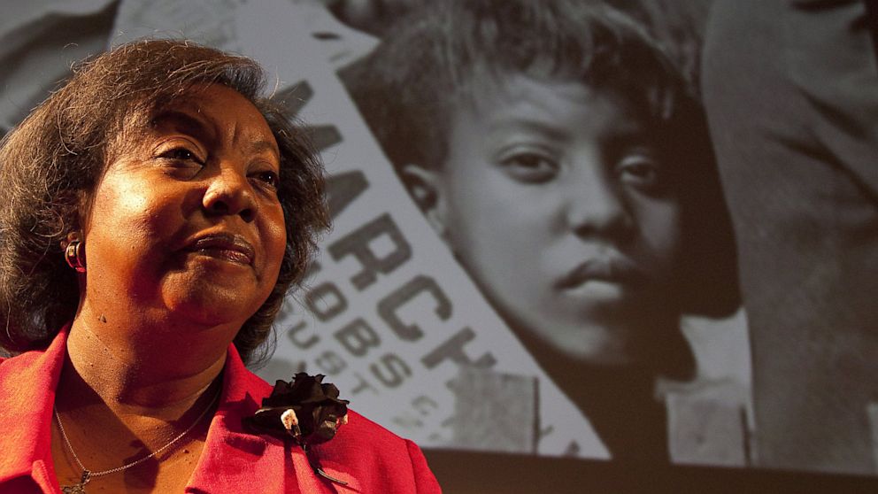 PHOTO: Edith Lee Payne stands in front of an image of herself at the age of 12, taken at the March on Washington after participating in a Black History Month program at the Detroit School of the Arts, Feb. 15, 2012.