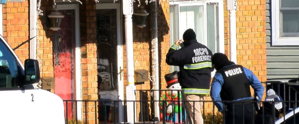 PHOTO: Investigators are shown outside the home in Long Branch, NJ, January 1, 2018, where a 16-year-old boy shot and killed 3 family members and a friend on New Years Eve. 