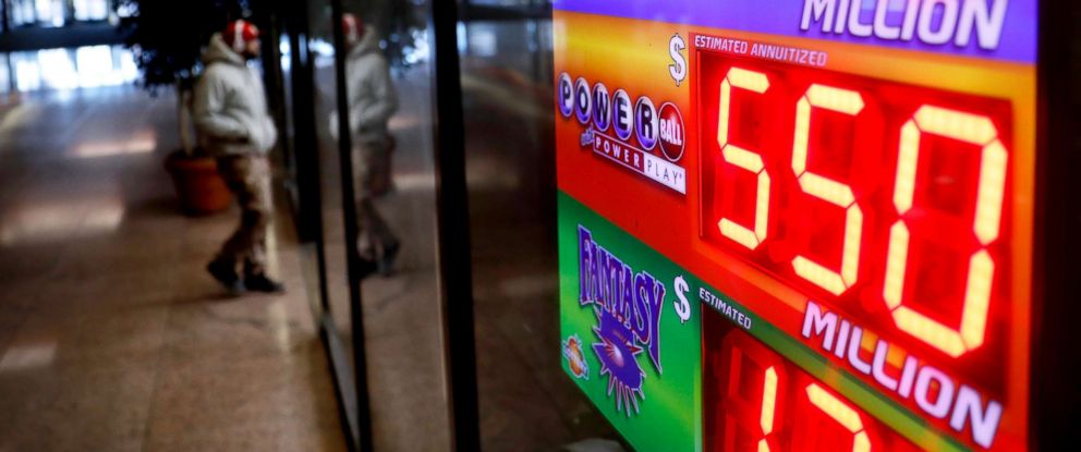 PHOTO: A sign advertises Powerball and Mega Millions lottery jackpots at a store in Atlanta, Georgia, Jan. 4, 2018. 