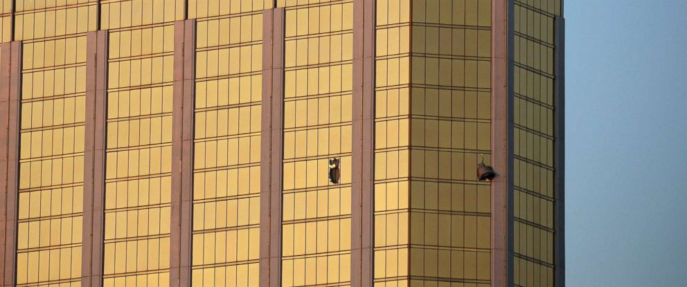 PHOTO: Drapes billow out of broken windows at the Mandalay Bay resort and casino on the Las Vegas Strip, Oct. 2, 2017, following a deadly shooting at a music festival.