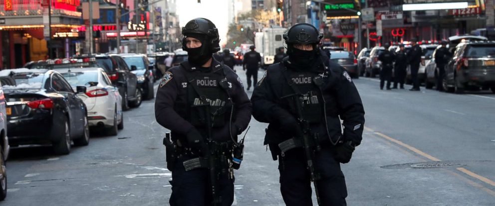 PHOTO: Police officers stand on a closed West 42nd Street near the New York Port Authority Bus Terminal after reports of an explosion in New York, Dec. 11, 2017.