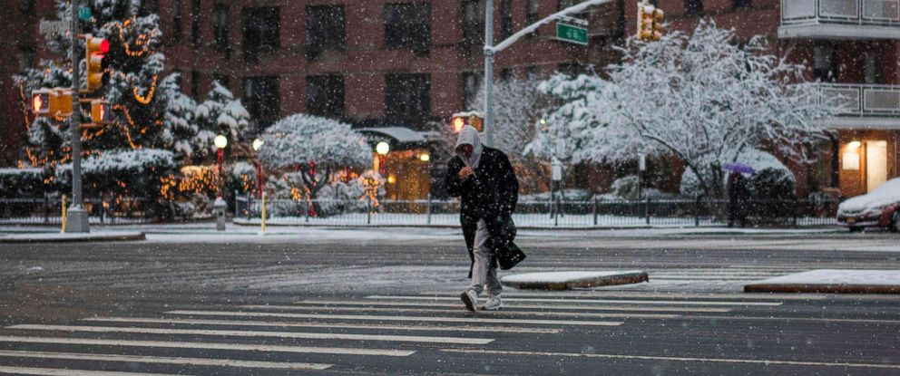 PHOTO: A man makes his way during a snowstorm in New York, Dec. 9, 2017. 