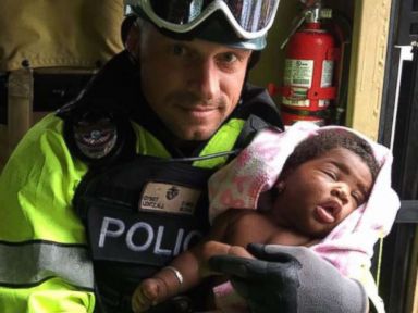 First responders rescue mother, baby from Irma-flooded home