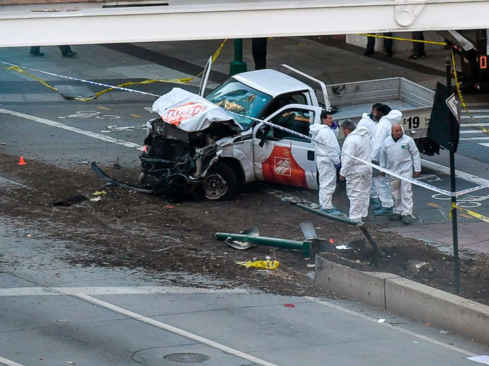 PHOTO: Investigators inspect a truck following an incident in New York City, Oct. 31, 2017. Several people were killed and numerous others injured in New York when a suspect plowed a vehicle into a bike and pedestrian path in Lower Manhattan.