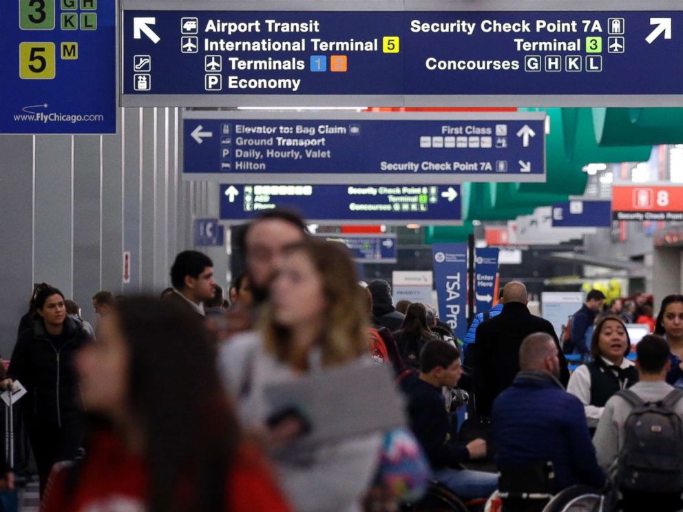 PHOTO: Passengers walk in Terminal 3 at OHare airport in Chicago, Nov. 21, 2017.