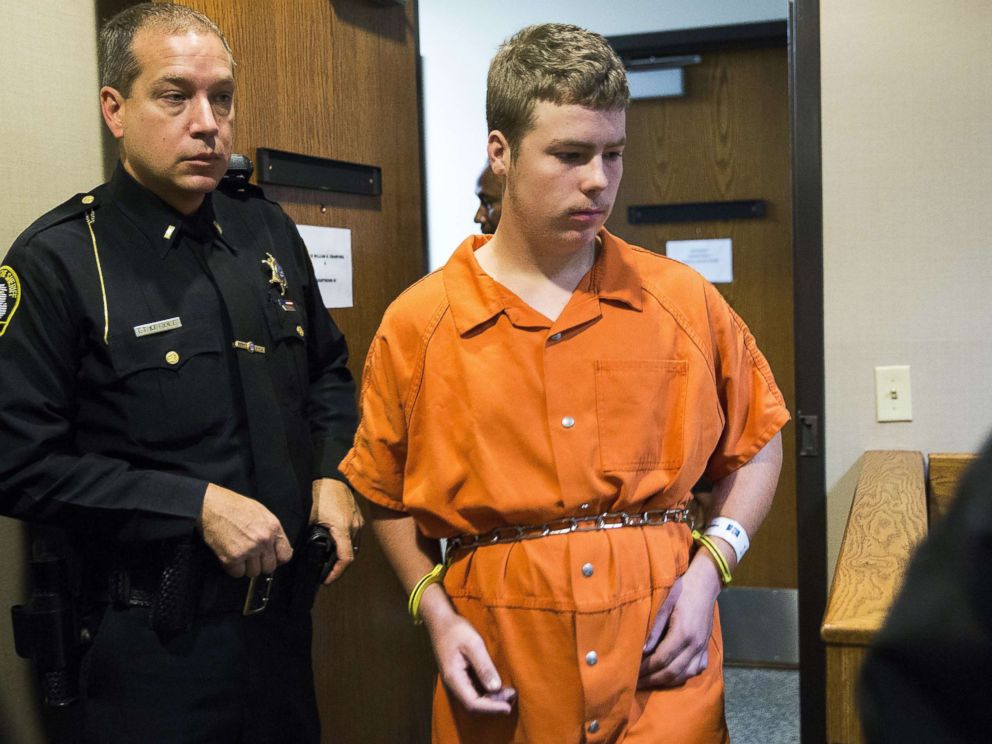 PHOTO: Kyle Anger of Clio, Mich., is led into the courtroom for his arraignment in front of Judge William Crawford on Oct. 24, 2017, in Genesee County District Court in downtown Flint, Mich.