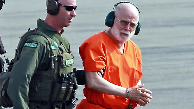 PHOTO: James Whitey Bulger is escorted from by U.S. Coast Guards in Boston, June, 30, 2011.