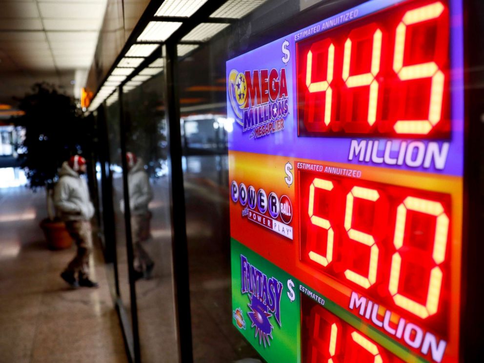 PHOTO: A sign advertises Powerball and Mega Millions lottery jackpots at a store in Atlanta, Jan. 4, 2018.