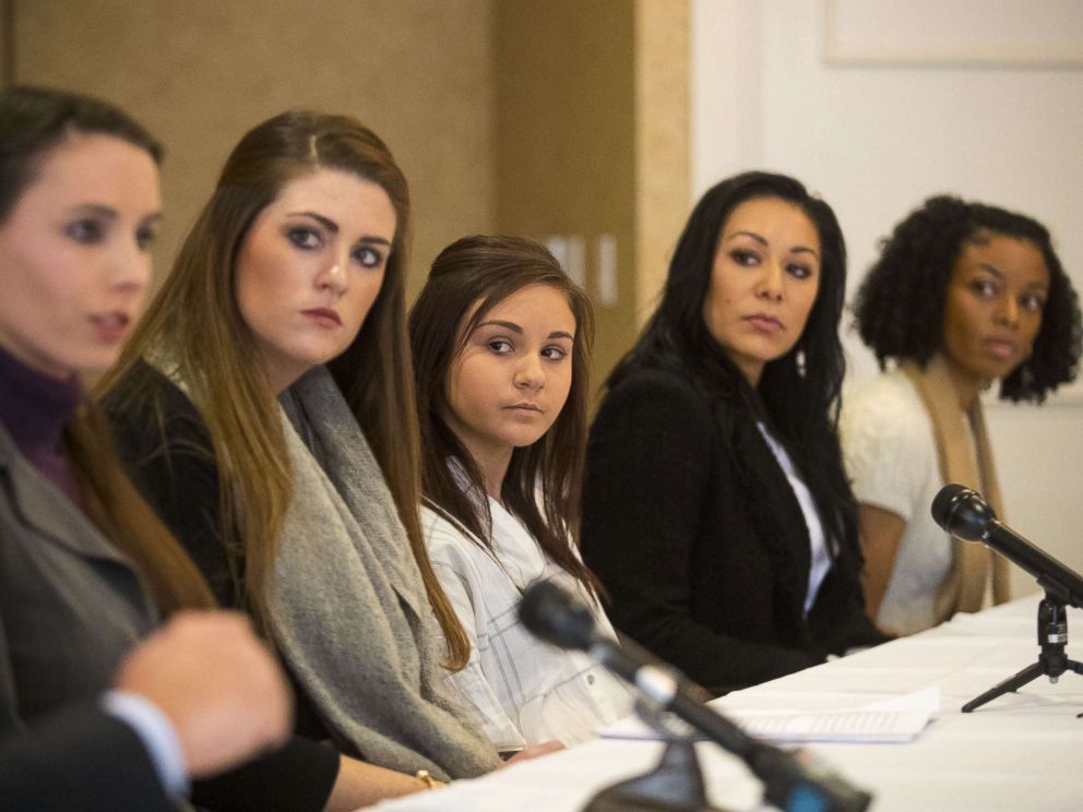 PHOTO: (L-) Rachael Denhollander, Sterling Riethman, Kaylee Lorincz, Jeanette Antolin and Tiffany Thomas appear at a press conference after Larry Nassar was sentenced to 60 years in prison on child pornography charges in Grand Rapids, Mich., Dec. 7, 2017.