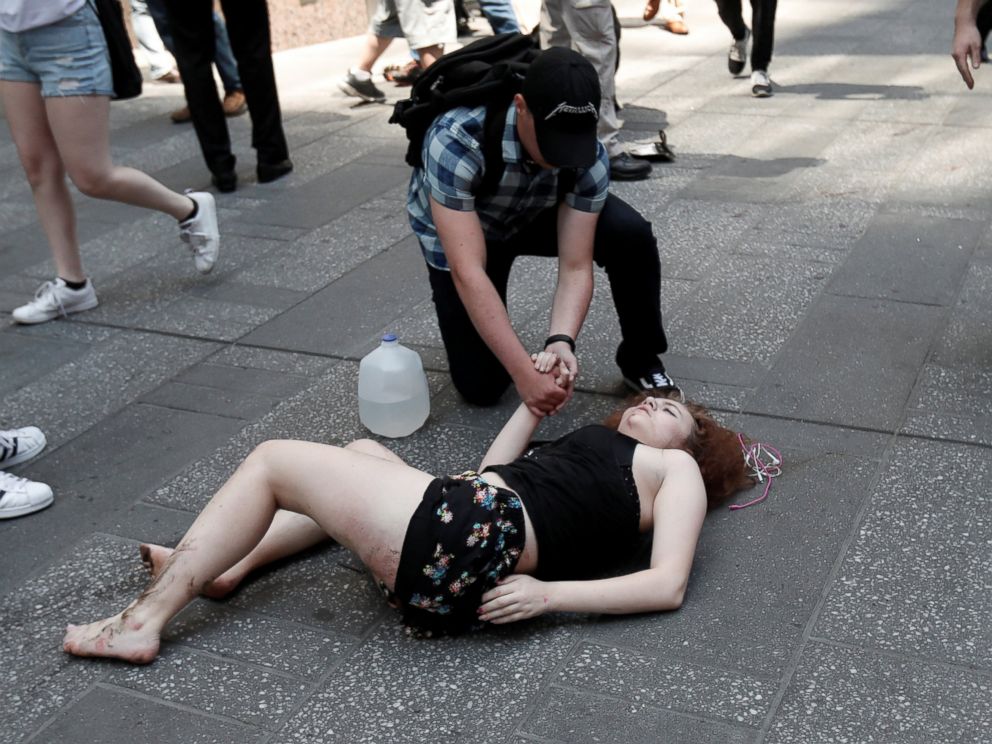 PHOTO: An injured woman lays on the sidewalk in Times Square after a speeding vehicle struck pedestrians on the sidewalk inn New York City, May 18, 2017.