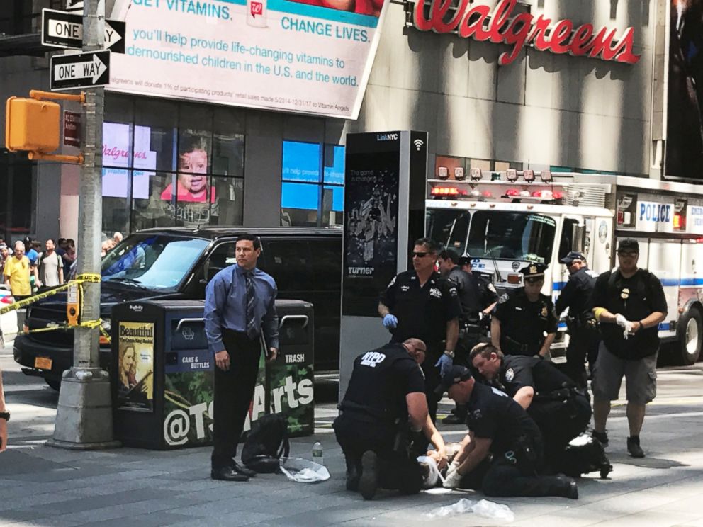 PHOTO: First responders are assisting injured pedestrians after a vehicle struck pedestrians on a sidewalk in Times Square in New York, May 18, 2017.