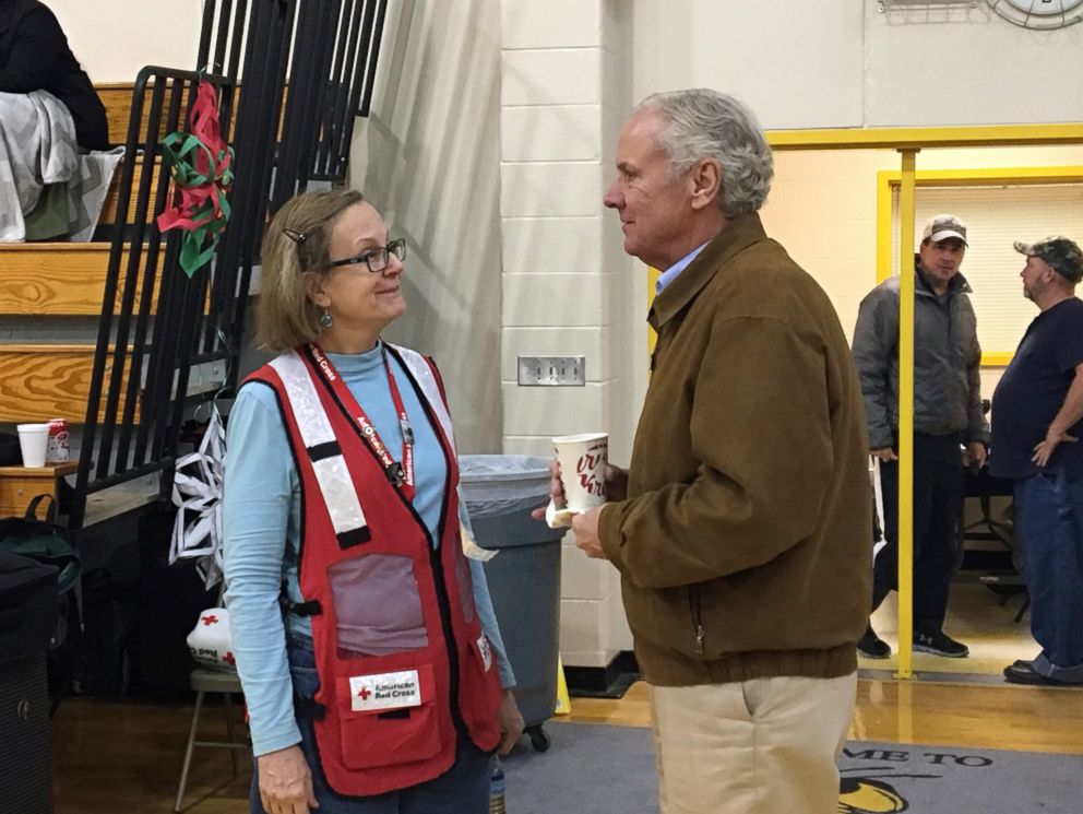 PHOTO: An image released by the American Red Cross shows South Carolina Governor Henry McMaster speaking to a volunteer at a relief site for survivors of a fatal train crash near Cayce, S.C., Feb. 4, 2018.