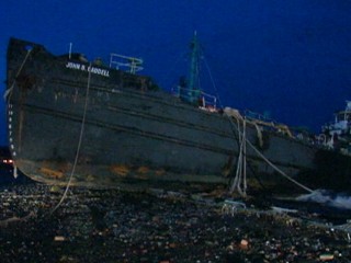 Watch: Water Tanker Runs Aground in Sandy Storm