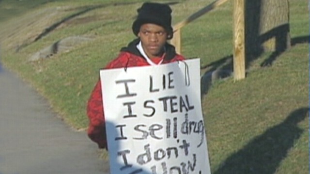 VIDEO: Indiana mother forces 14-year-old son to wear a sign detailing his crimes.